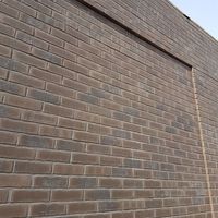 Eine Ziegelwand mit der Fassade vom Typ Bochum.